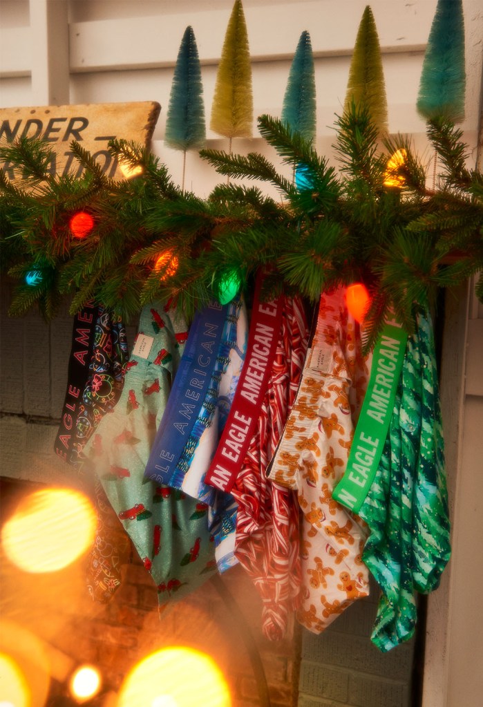 american eagle men's holiday underwear hanging by a chimney