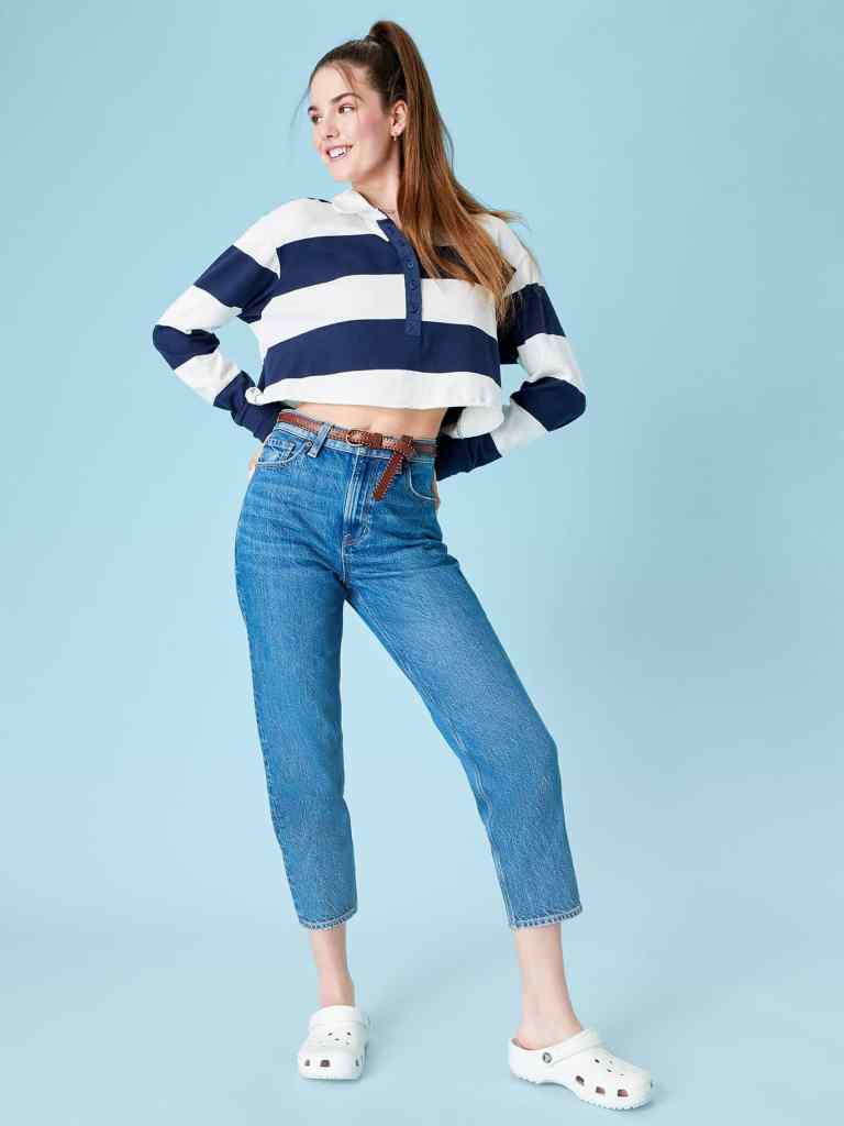 woman wearing white and blue striped shirt with medium wash Mom straight jeans