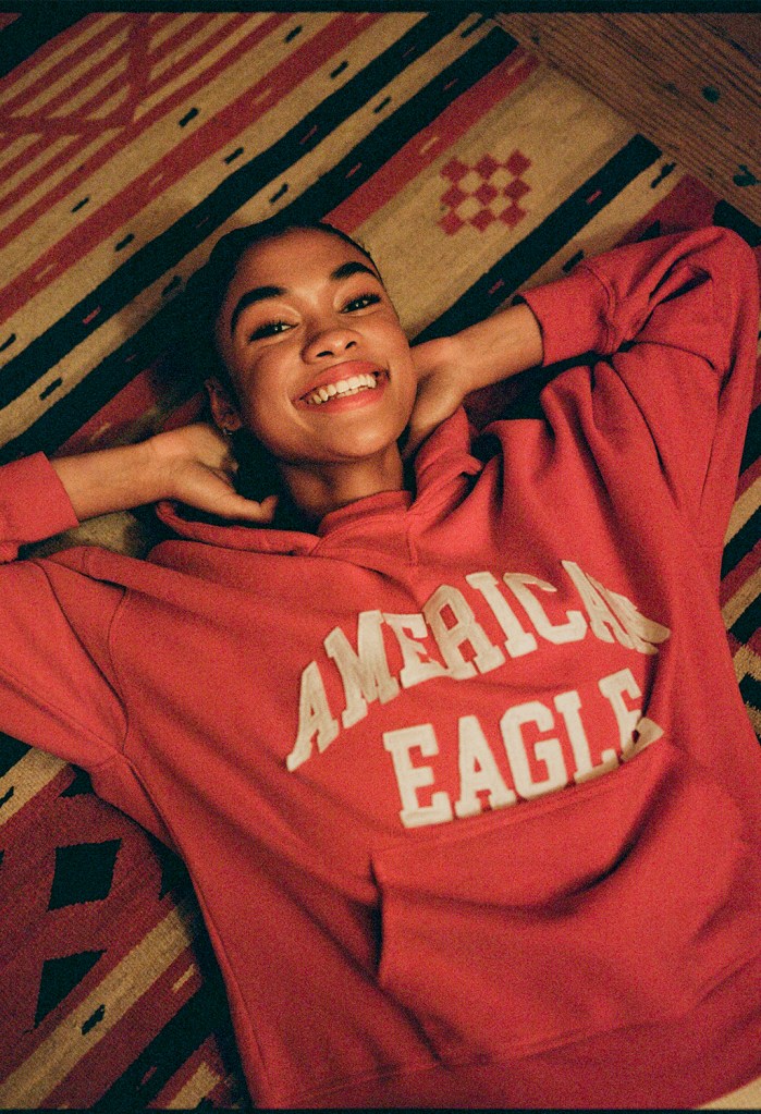girl wearing a red American Eagle hoodie