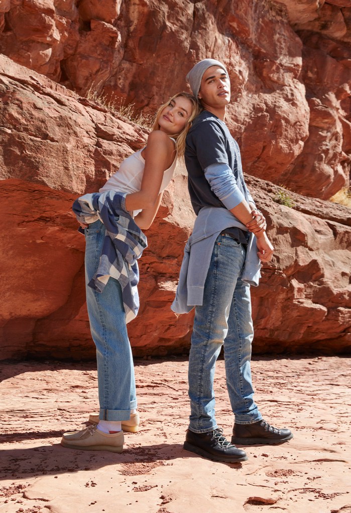 guy and girl wearing light wash blue jeans and tshirts