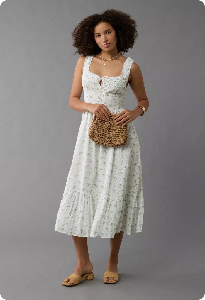 girl wearing a white graduation dress from american eagle