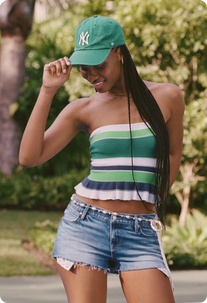 girl wearing a tube top and low rise short shorts from american eagle