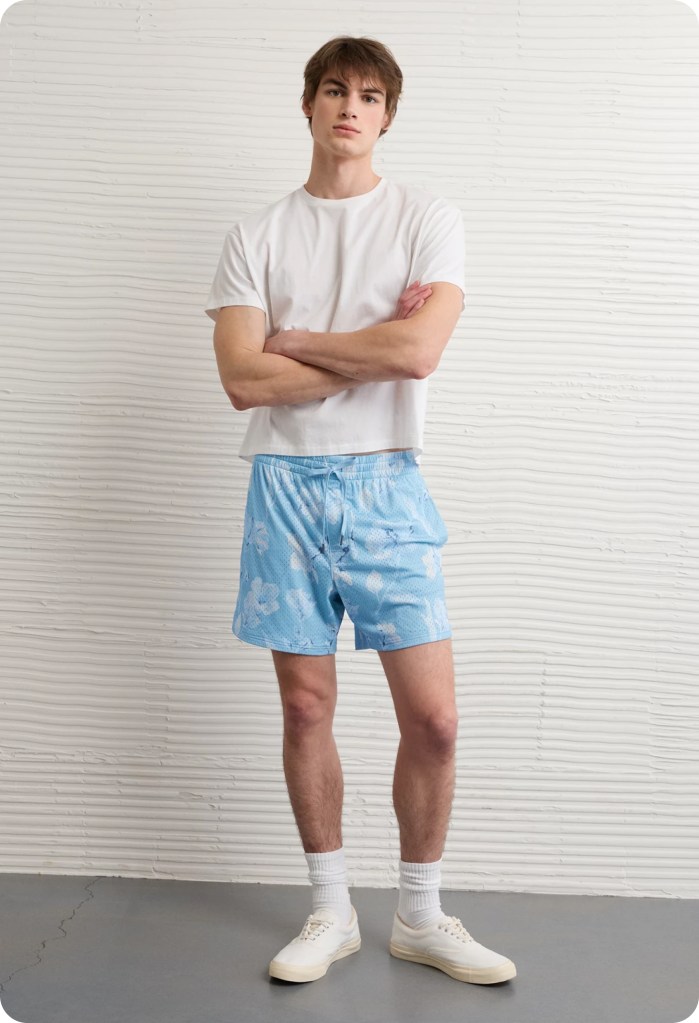 guy wearing mid length shorts and a tshirt from american eagle